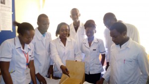 Ruth Mbugua, Head of Department Community Health Nursing demonstrating to Bachelor of Science Nursing students on use of an Infantometer during growth monitoring.